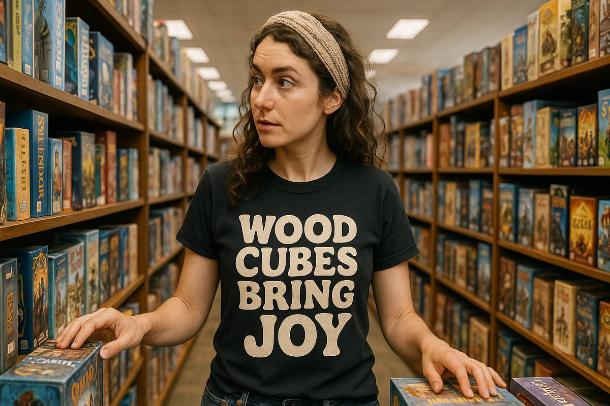 Lifestyle shot of the "Wood Cubes Bring Joy" black board game tee shirts in a real-world setting