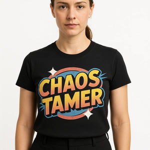 Close-up of the "Chaos Tamer" gold print on a premium Bella+Canvas black wedding planner t shirt