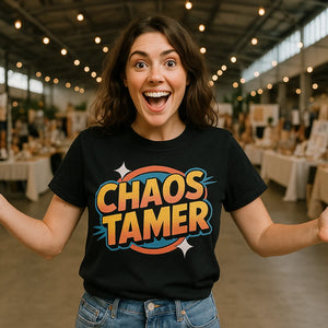 Lifestyle shot of the "Chaos Tamer" black wedding planner t shirt in a real-world setting