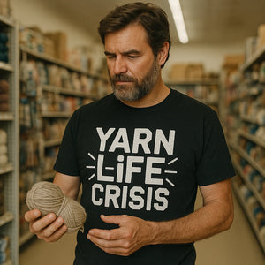 Lifestyle shot of the "Yarn Life Crisis" black knitting shirts in a real-world setting