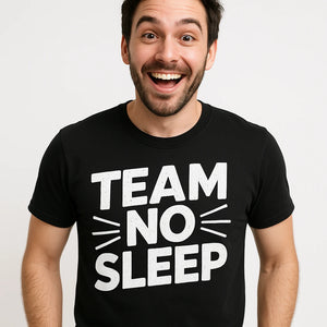 Close-up of the "Team No Sleep" white print on a premium Bella+Canvas black sleep deprived shirts