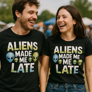 Person wearing the black alien t shirt graphic tee - "Aliens Made Me Late" design
