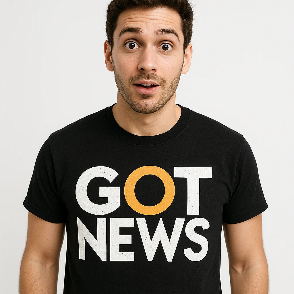 Close-up of the "Got News" white print on a premium Bella+Canvas black journalist t shirt