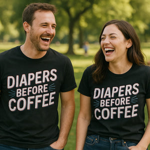 Person wearing the black new parents t shirt graphic tee - "Diapers Before Coffee" design