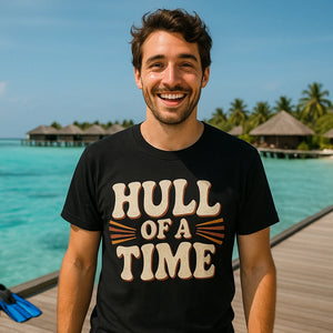 Lifestyle shot of the "Hull of a Time" black boat neck t shirt in a real-world setting