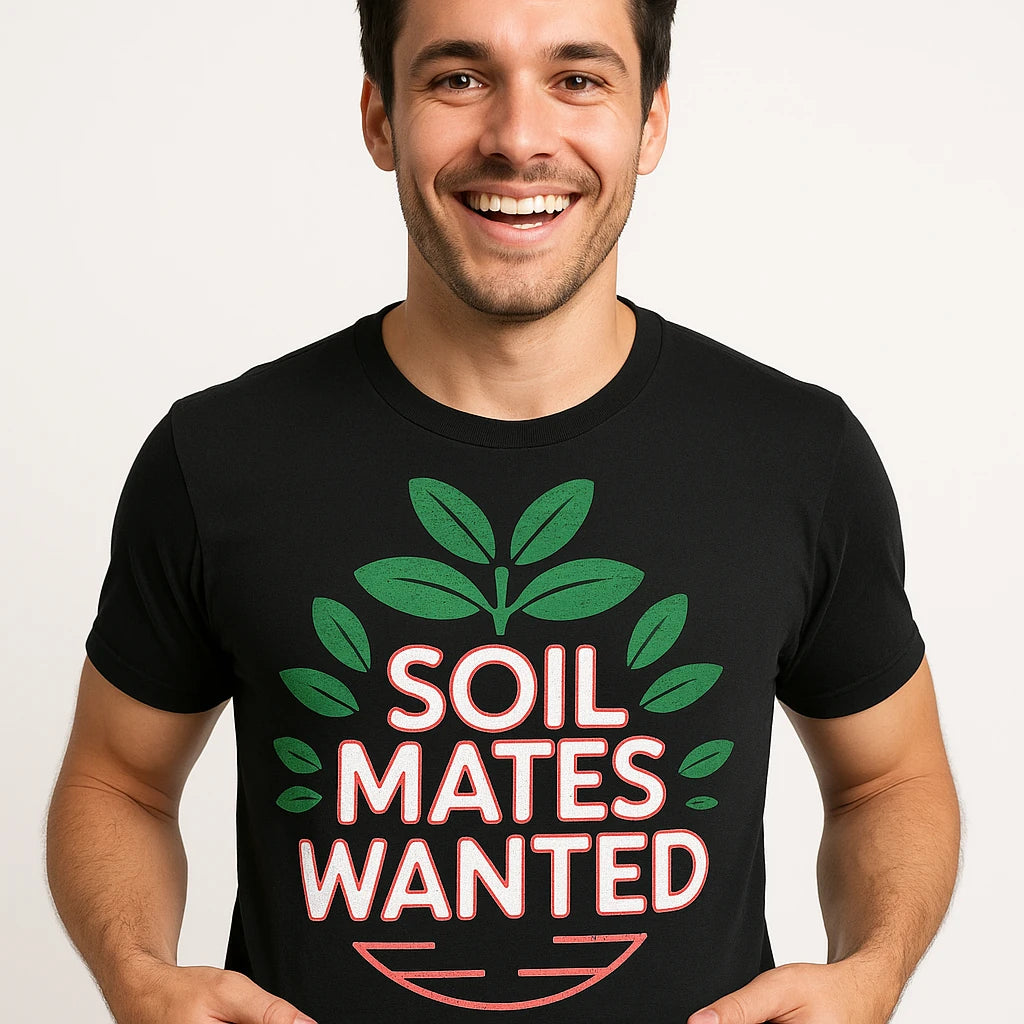 Close-up of the "Soil Mates Wanted" gray print on a premium Bella+Canvas black botany t shirt