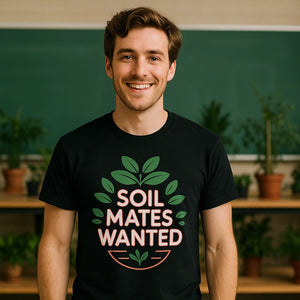 Lifestyle shot of the "Soil Mates Wanted" black botany t shirt in a real-world setting