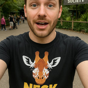 "Neck Goals" black giraffe print tee, photographed as unique gifts for giraffe lovers