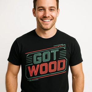 Close-up of the "Got Wood" green print on a premium Bella+Canvas black carpentry t shirt