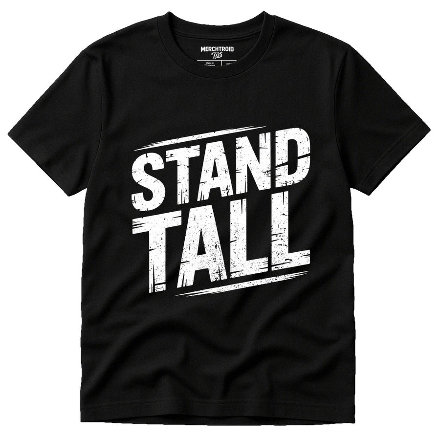 A black T-shirt with the words "STAND TALL" printed in bold, distressed white letters on the front. The design has a rugged and motivational feel.