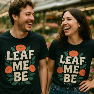 Person wearing the black florist shirts graphic tee - "Leaf Me Be" design