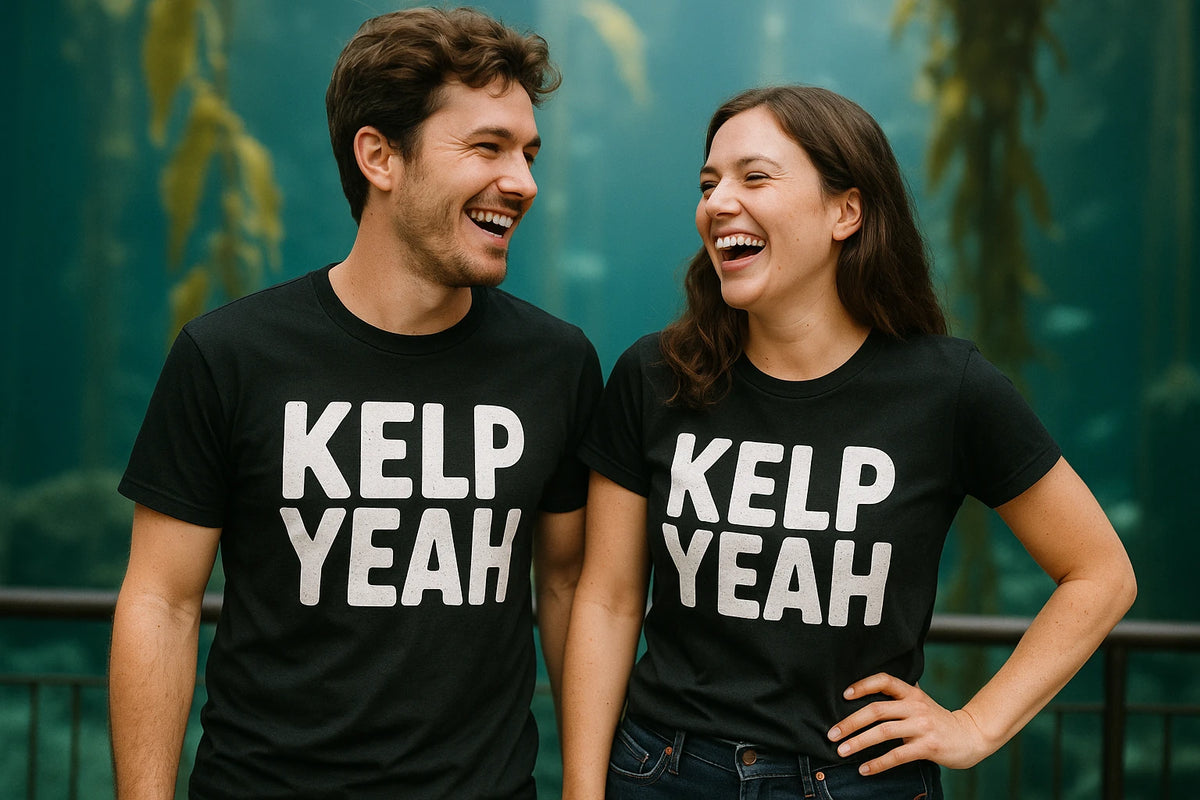 Person wearing the black sea otter shirts graphic tee - "Kelp Yeah" design