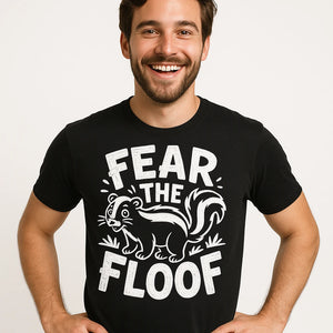 Close-up of the "Fear the Floof" white print on a premium Bella+Canvas black skunks t shirt