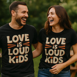 Person wearing the black family life t shirt graphic tee - "Love Is Loud Kids" design