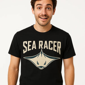 Close-up of the "Sea Racer" cream print on a premium Bella+Canvas black stingray shirts