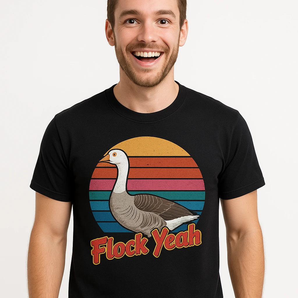 Close-up of the "Flock Yeah" tan print on a premium Bella+Canvas black geese t shirt