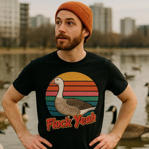 Lifestyle shot of the "Flock Yeah" black geese t shirt in a real-world setting