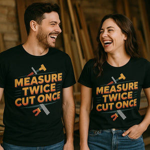 Person wearing the black carpentry t shirt graphic tee - "Measure Twice Cut Once" design