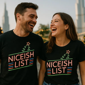 Person wearing the black christmas tshirt mens graphic tee - "Niceish List" design