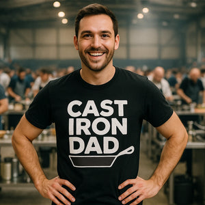 Lifestyle shot of the "Cast Iron Dad" black line cook shirts in a real-world setting