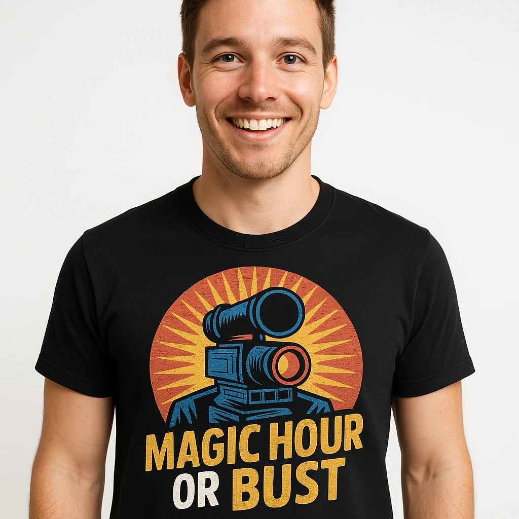 Close-up of the "Magic Hour Or Bust" gray print on a premium Bella+Canvas black film director t shirt