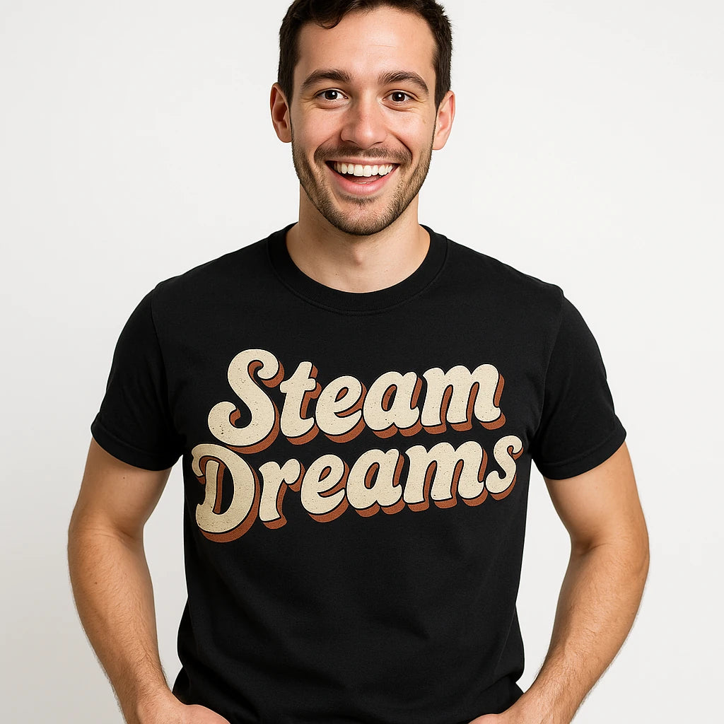Close-up of the "Steam Dreams" beige print on a premium Bella+Canvas black steampunk graphic tee