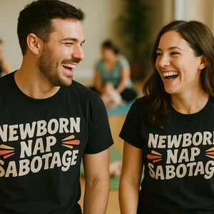 Person wearing the black shirts for expecting parents graphic tee - "Newborn Nap Sabotage" design