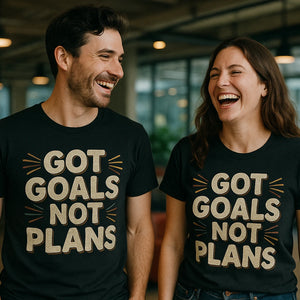 Person wearing the black entrepreneurs t shirt graphic tee - "Got Goals Not Plans" design