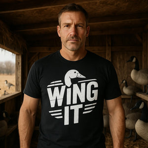 Lifestyle shot of the "Wing It" black geese t shirt in a real-world setting