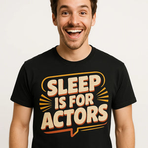 Close-up of the "Sleep Is for Actors" beige print on a premium Bella+Canvas black film director t shirt
