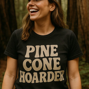 "Pine Cone Hoarder" black nature walk shirts, photographed as nature walk lover gift