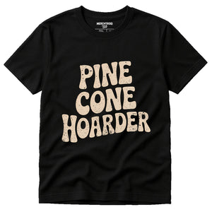 Black Nature Walk Shirts - "Pine Cone Hoarder" graphic tee with beige print, flat lay product photo