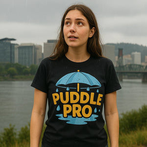 Lifestyle shot of the "Puddle Pro" black rain forest shirts in a real-world setting