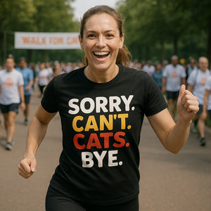 Lifestyle shot of the "Sorry. Cant. Cats. Bye." black funny t shirts for cat lovers in a real-world setting