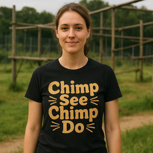 Lifestyle shot of the "Chimp See Chimp Do" black chimpanzee t shirt in a real-world setting