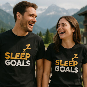 Person wearing the black cotton sleep shirts graphic tee - "Sleep Goals" design