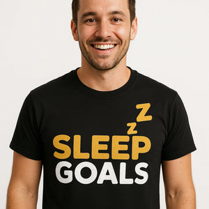 Close-up of the "Sleep Goals" gold print on a premium Bella+Canvas black cotton sleep shirts