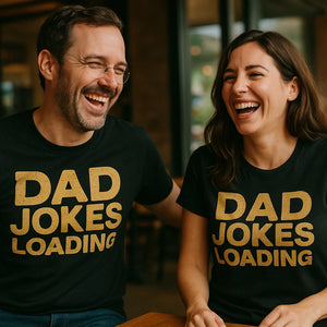 Person wearing the black dad shirts for fathers day graphic tee - "Dad Jokes Loading" design