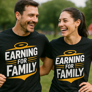 Person wearing the black dad to be shirts graphic tee - "Earning for Family" design