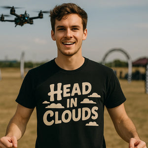 Lifestyle shot of the "Head in Clouds" black flying fish t shirt in a real-world setting
