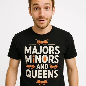 Close-up of the "Majors Minors and Queens" beige print on a premium Bella+Canvas black ant t shirt