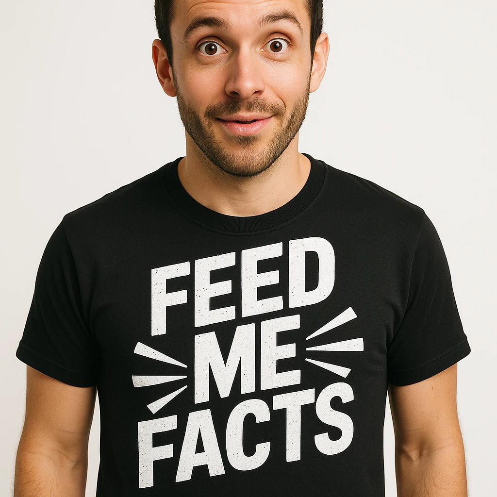 Close-up of the "Feed Me Facts" white print on a premium Bella+Canvas black studying t shirt