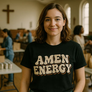 Lifestyle shot of the "Amen Energy" black love and faith t shirts in a real-world setting