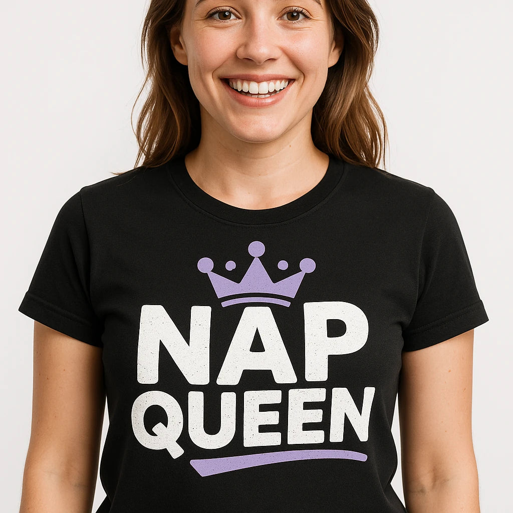 Close-up of the "Nap Queen" white print on a premium Bella+Canvas black relaxing t shirt