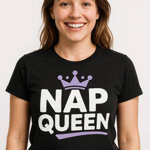 Close-up of the "Nap Queen" white print on a premium Bella+Canvas black relaxing t shirt