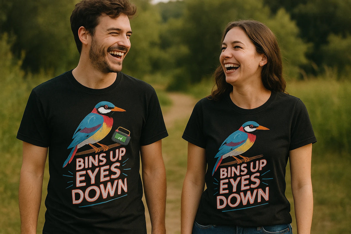Person wearing the black bird watching t shirts funny graphic tee - "Bins Up Eyes Down" design
