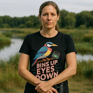 Lifestyle shot of the "Bins Up Eyes Down" black bird watching t shirts funny in a real-world setting