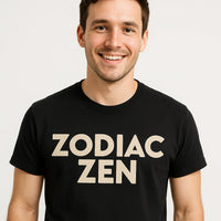 A person with short hair is wearing a black T-shirt with the text 
