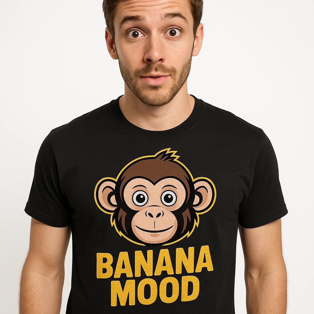 Close-up of the "Banana Mood" tan print on a premium Bella+Canvas black monkey t shirt