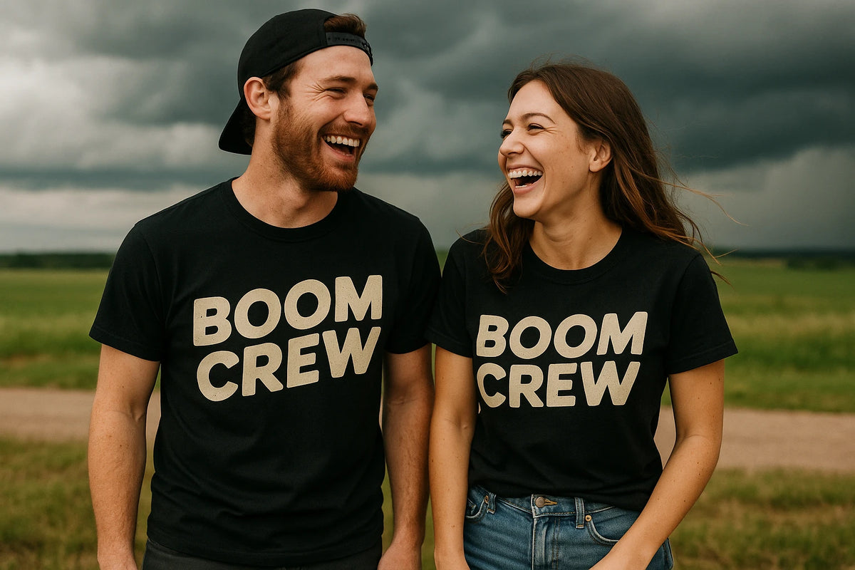 Person wearing the black storms t shirt graphic tee - "Boom Crew" design
